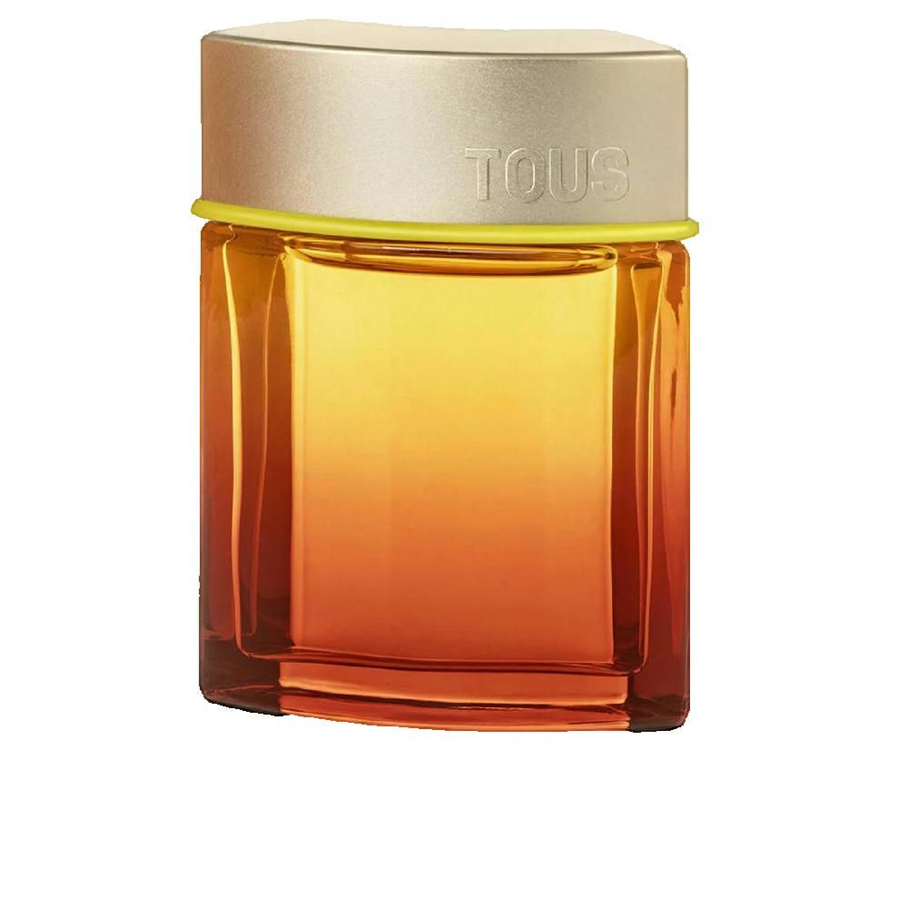 Tous Spritz EDT Herrenparfum Flakon mit goldenem Verschluss und gelbem Ring. Glasflasche mit Farbverlauf von Orange zu Gelb.