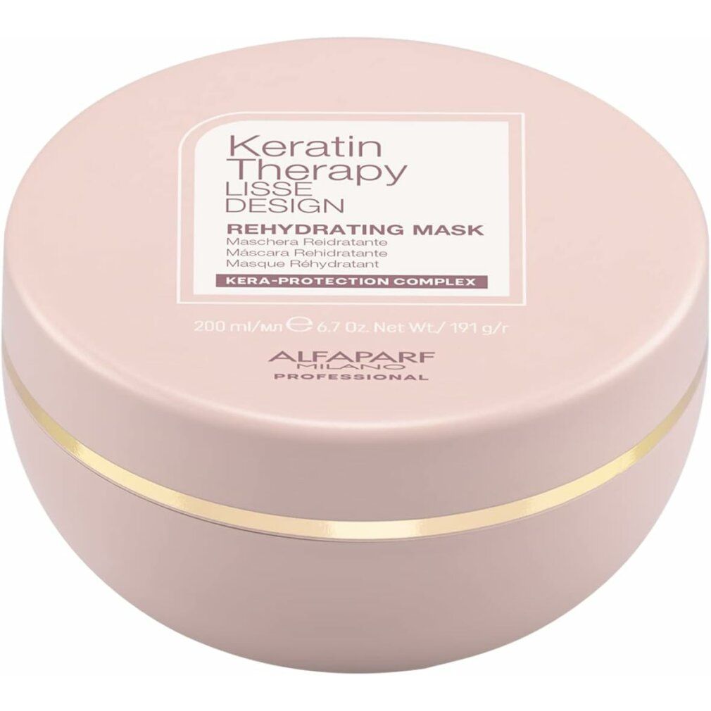 Runde, rosafarbene Dose mit Keratin Therapy Lisse Design Rehydrating Mask. Enthält KERA-PROTECTION COMPLEX.