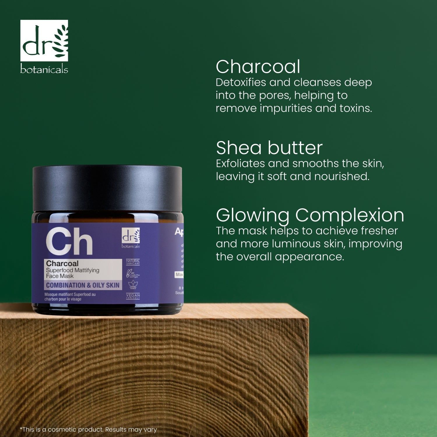 Tiegel auf Holzblock. Dunkelbraunes Glas mit schwarzem Deckel. Violettes Etikett. Text: Charcoal, Shea Butter, Glowing Complexion.