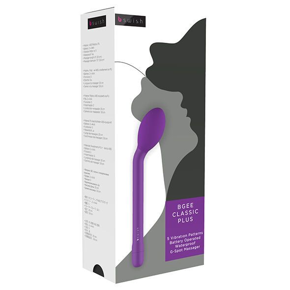 Lila Vibrator in Verpackung. Gebogene Form, länglicher Griff. Text: B Swish, BGEE Classic Plus, 5 Vibrationsmuster, wasserdicht, G-Punkt-Massage.