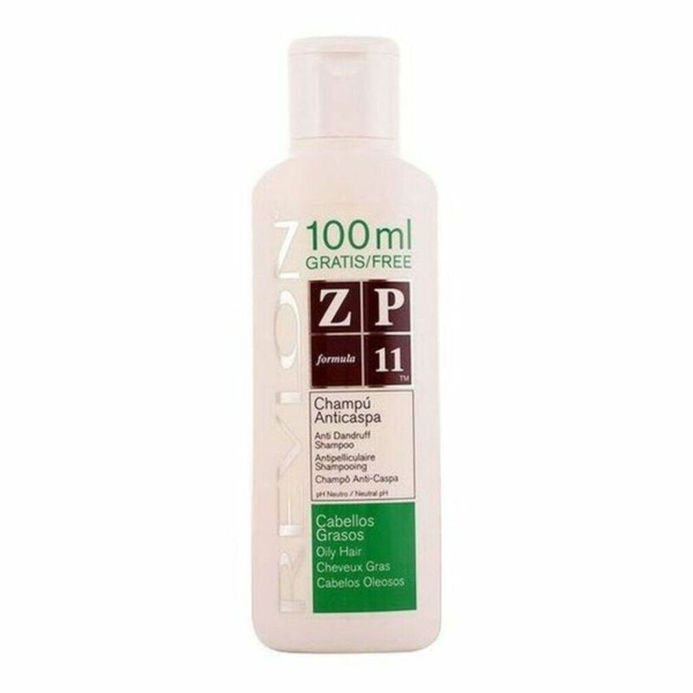 Weiße Shampoo-Flasche mit grün-weißem Etikett. Text: Revlon, ZP 11, Champú Anticaspa, Cabellos Grasos. Gratis/Free.