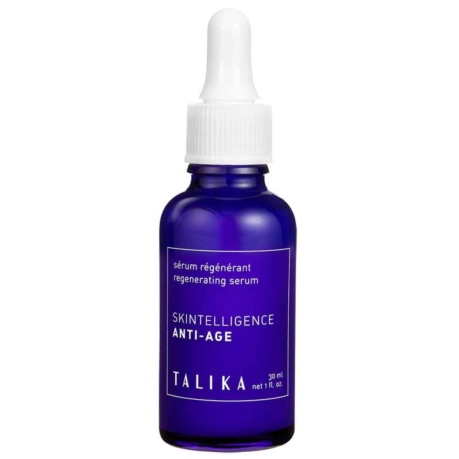 Blaue Glasflasche mit weißem Tropfer. Aufschrift: Skintelligence Anti-Age, Talika. Regenerierendes Serum.