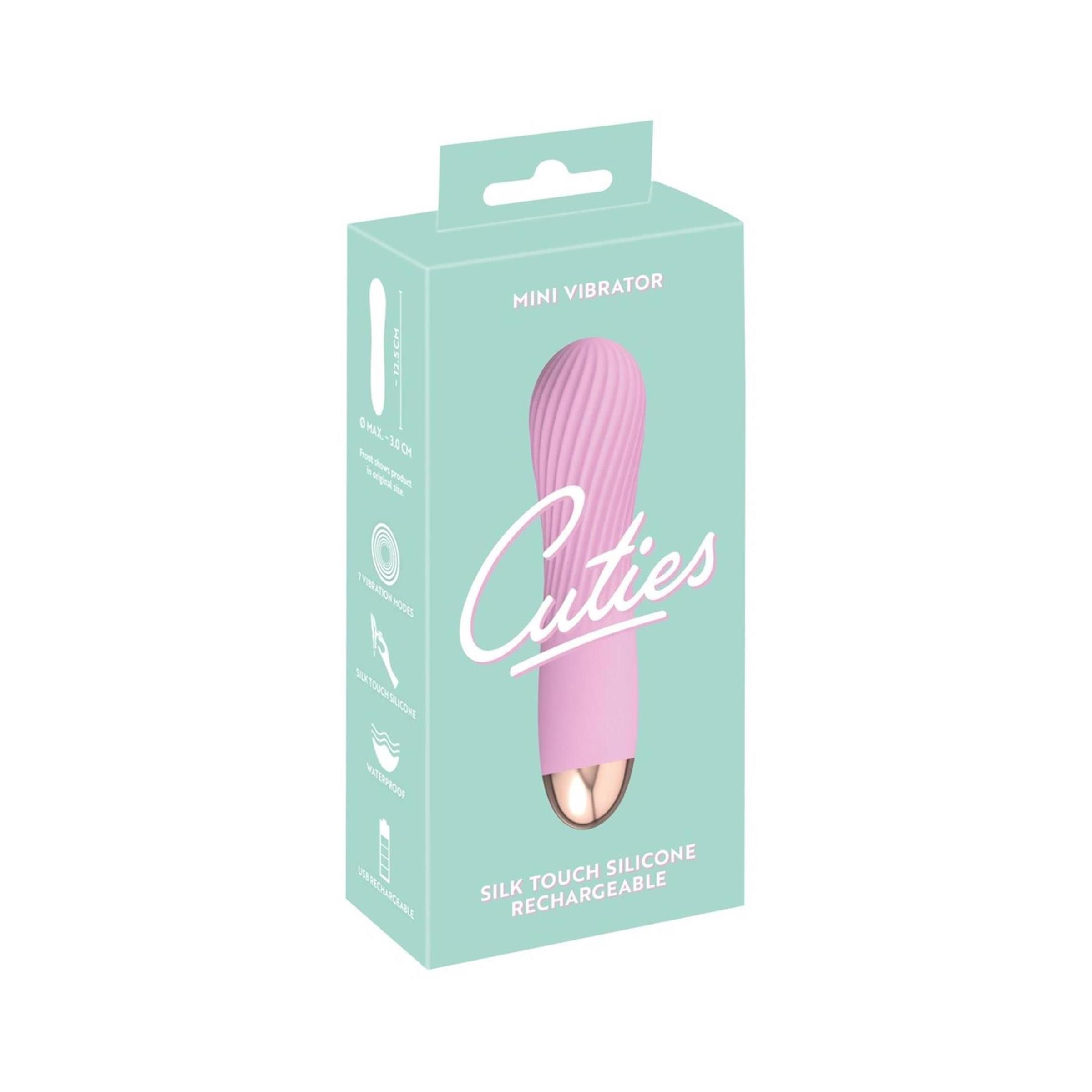 Verpackung mit rosa Vibrator. Aufschrift 'Cuties', 'Mini Vibrator'.