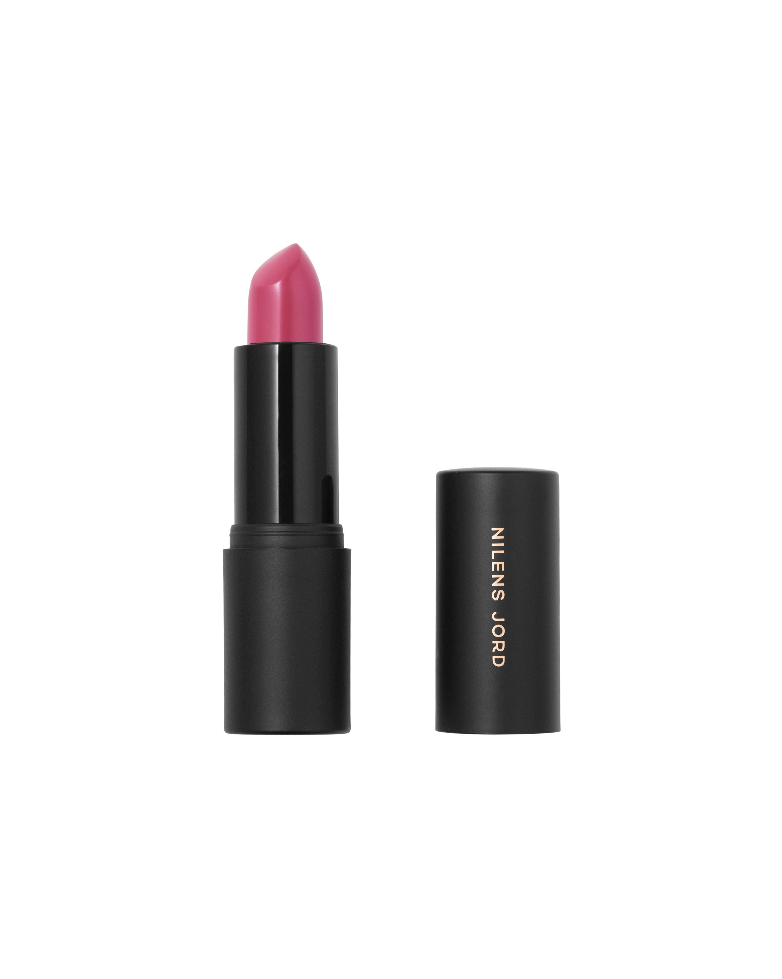 Ein schwarzer Lippenstift mit pinker Farbe, der Deckel liegt daneben.