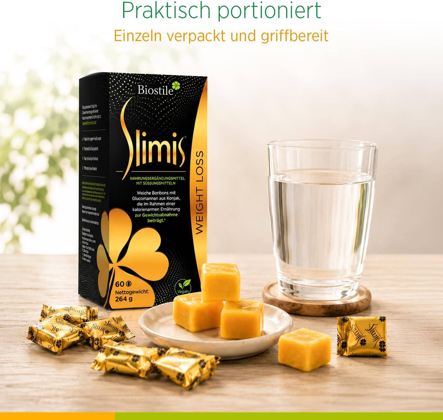 Biostile Slimis, einzeln verpackte Bonbons, Glas Wasser.