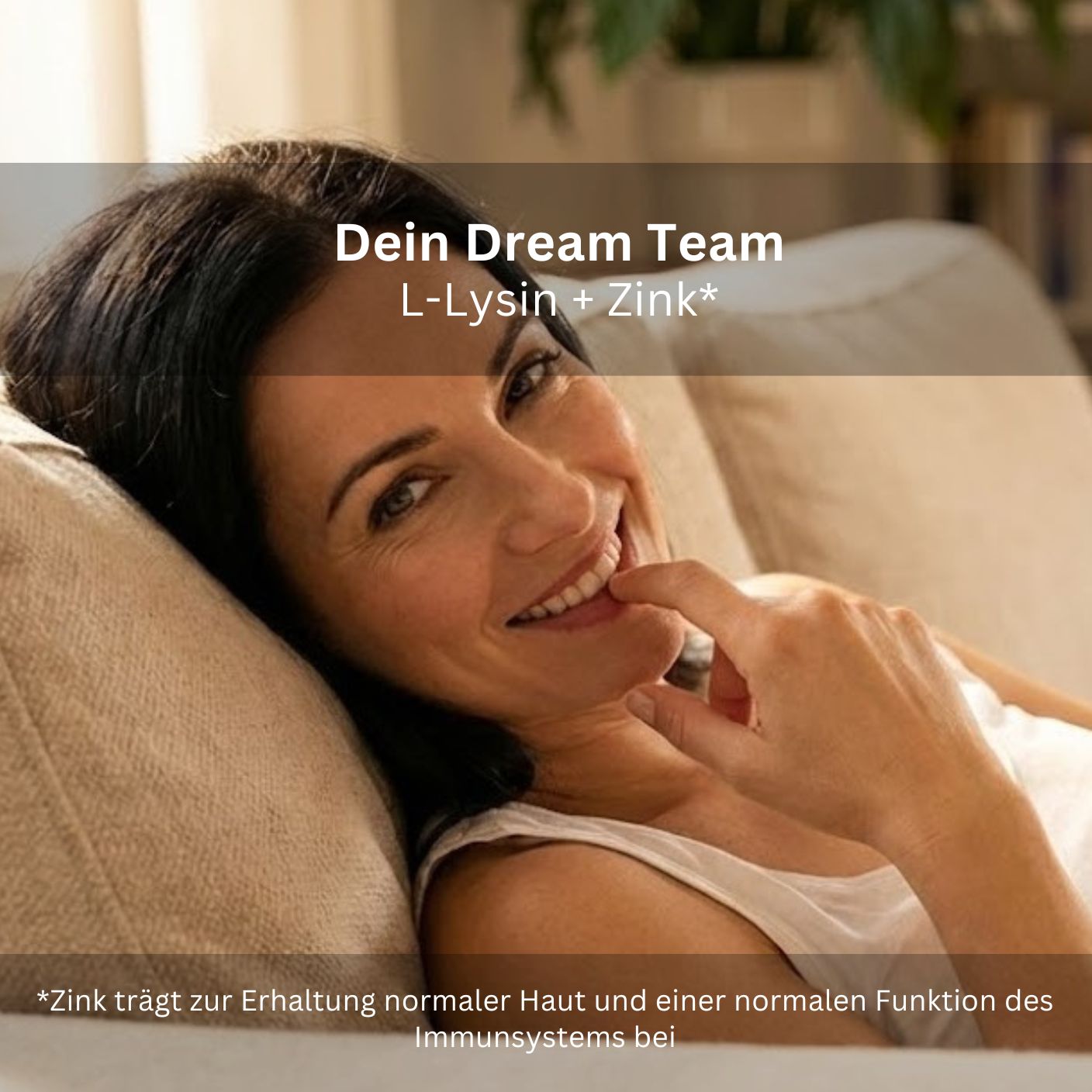 Frau lächelt. Text: Dein Dream Team L-Lysin + Zink. Text: Zink trägt zur Erhaltung normaler Haut und normaler Immunfunktion bei.