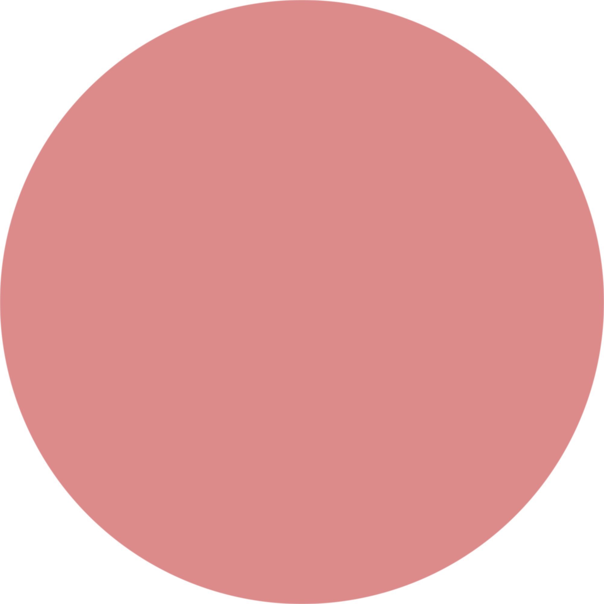 Ein kreisförmiger Farbfleck in Rosa.