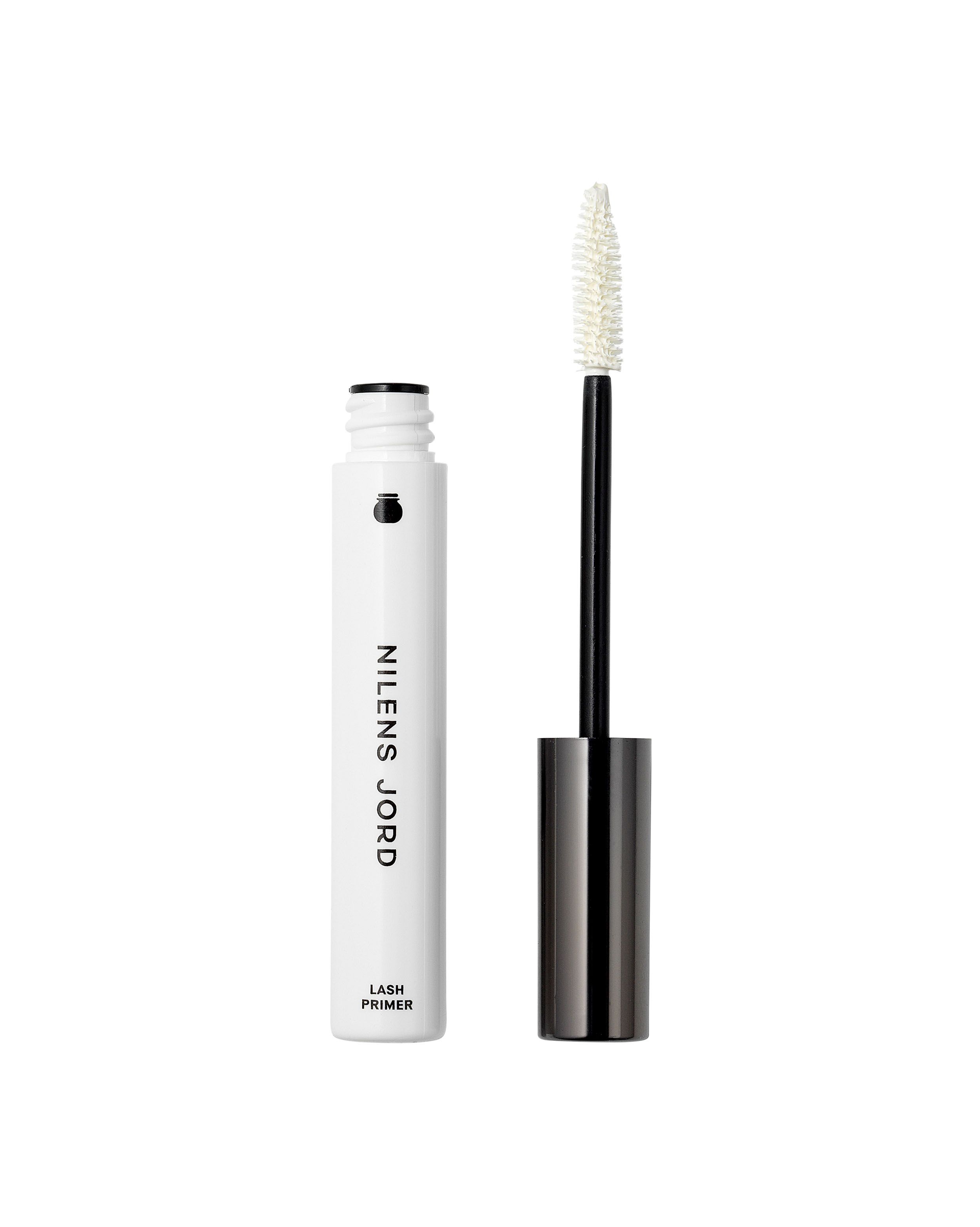 Nilens Jord Lash Primer: weiße Bürste mit schwarzem Stiel und silbernem Griff, daneben weiße Tube mit schwarzem Deckel.
