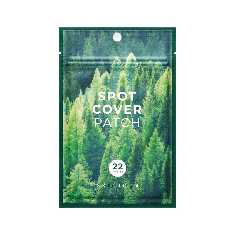 Busta con scritta « SPOT COVER PATCH ». Contiene 22 patch. Marchio: SKIN1004. Sfondo: foresta.