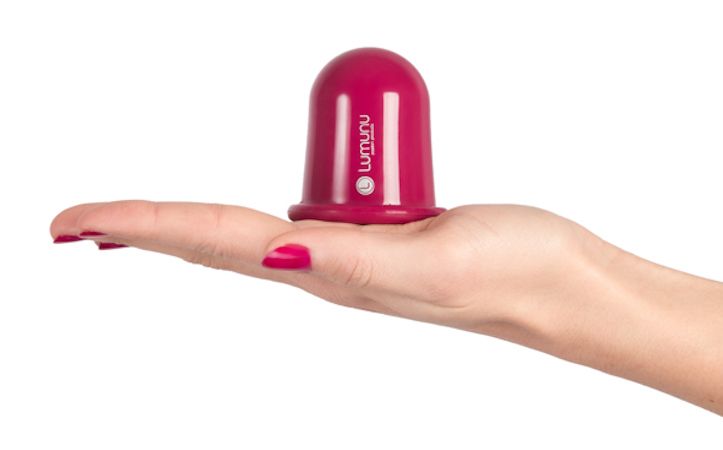 Magenta Anti-Cellulite-Sauger "Cellu-Los" in Hand. Runde Form.