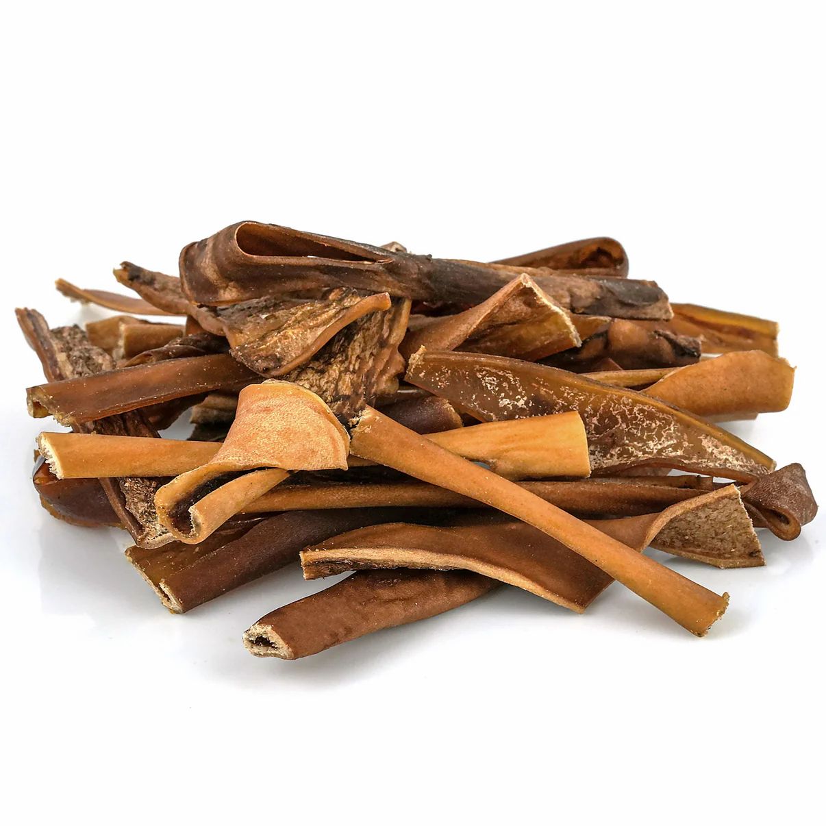 Haufen von braunen, getrockneten Kauplatten. Verschiedene Formen und Größen, einige gerollt.