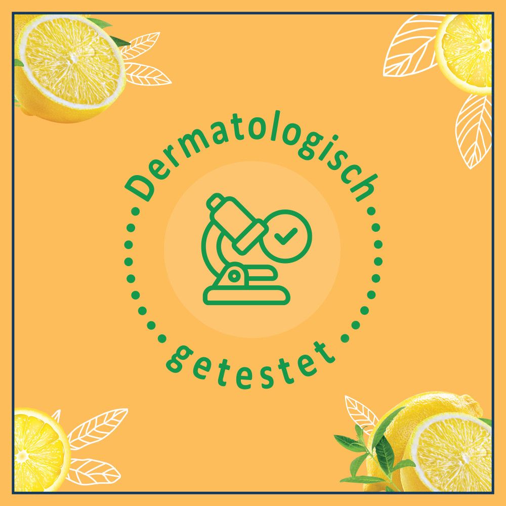 Kreisförmiges Logo mit Text 'Dermatologisch getestet'. Gelber Hintergrund mit Zitronen und Blättern.
