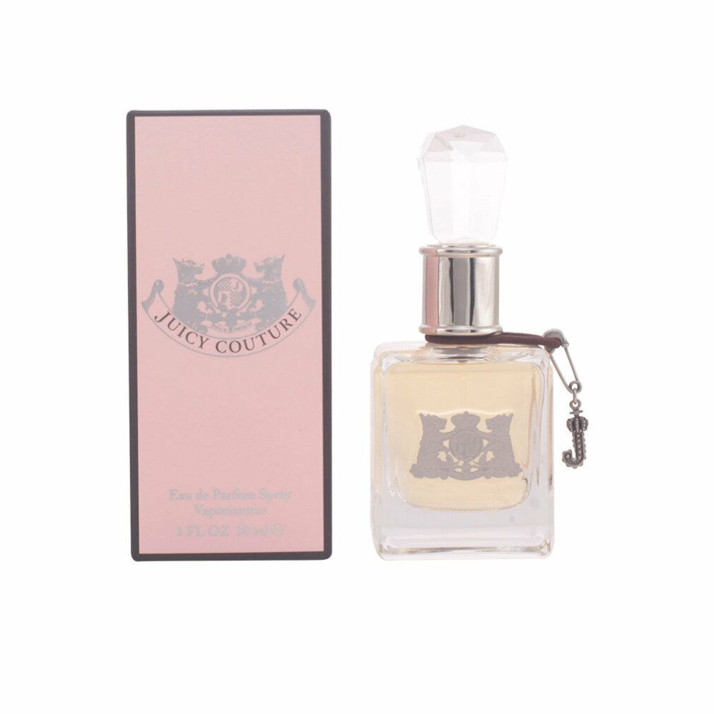 Juicy Couture Eau de Parfum Flakon mit Schachtel. Quadratischer Glasflakon mit silbernem Emblem und Kristallverschluss.