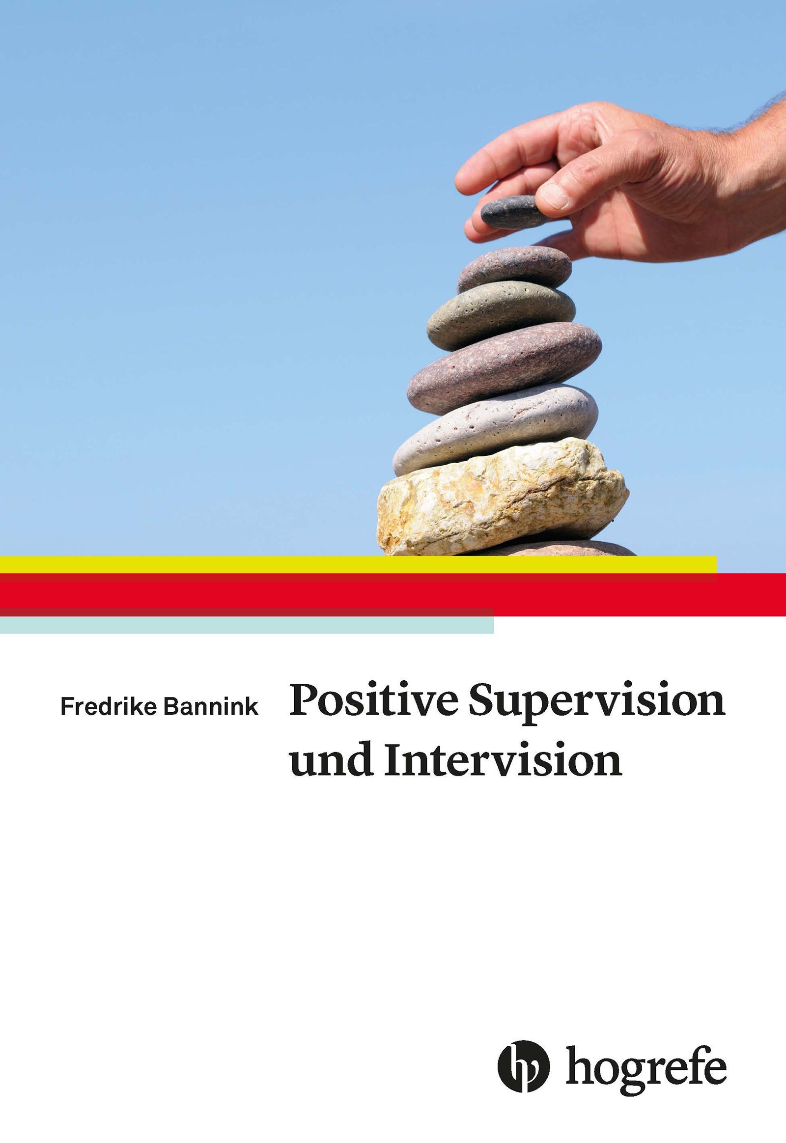 Buchcover mit Steinturm und Hand. Titel: Positive Supervision und Intervision. Autor: Fredrike Bannink. Verlag: Hogrefe.
