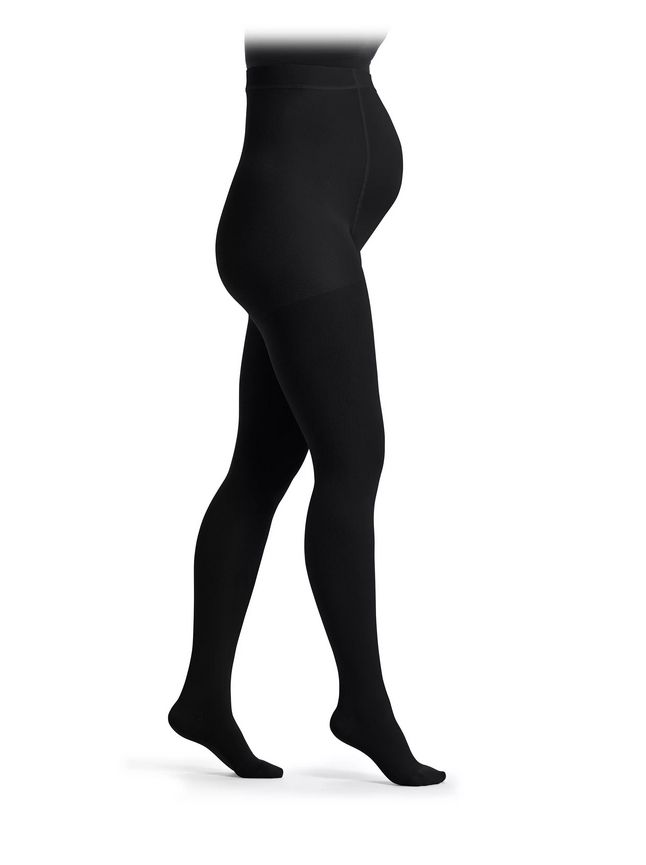 Schwarze Kompressionsstrumpfhose für Schwangere. Blick von der Seite. Hoher Bund.
