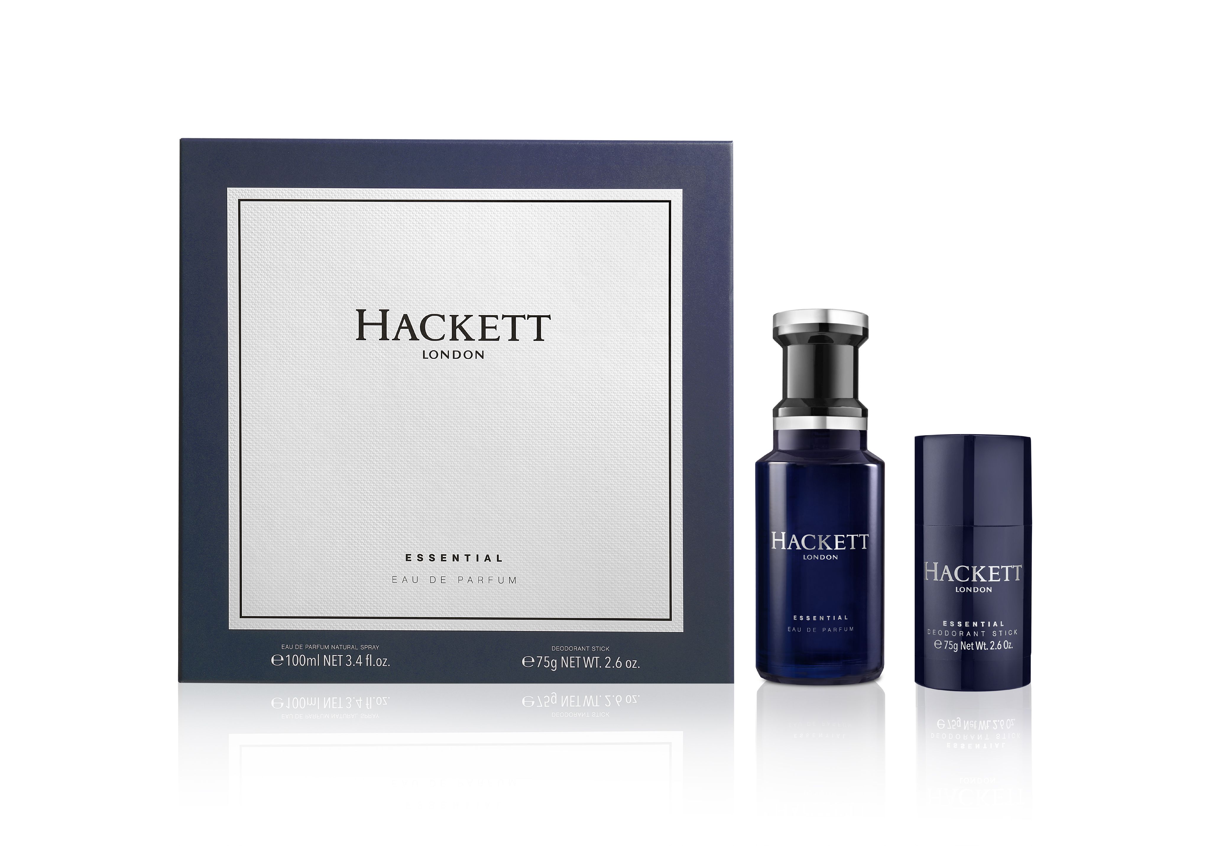 Geschenkset mit Eau de Parfum und Deo-Stick. Dunkelblaue Verpackung mit weißem Logo. Flakon und Stick daneben.