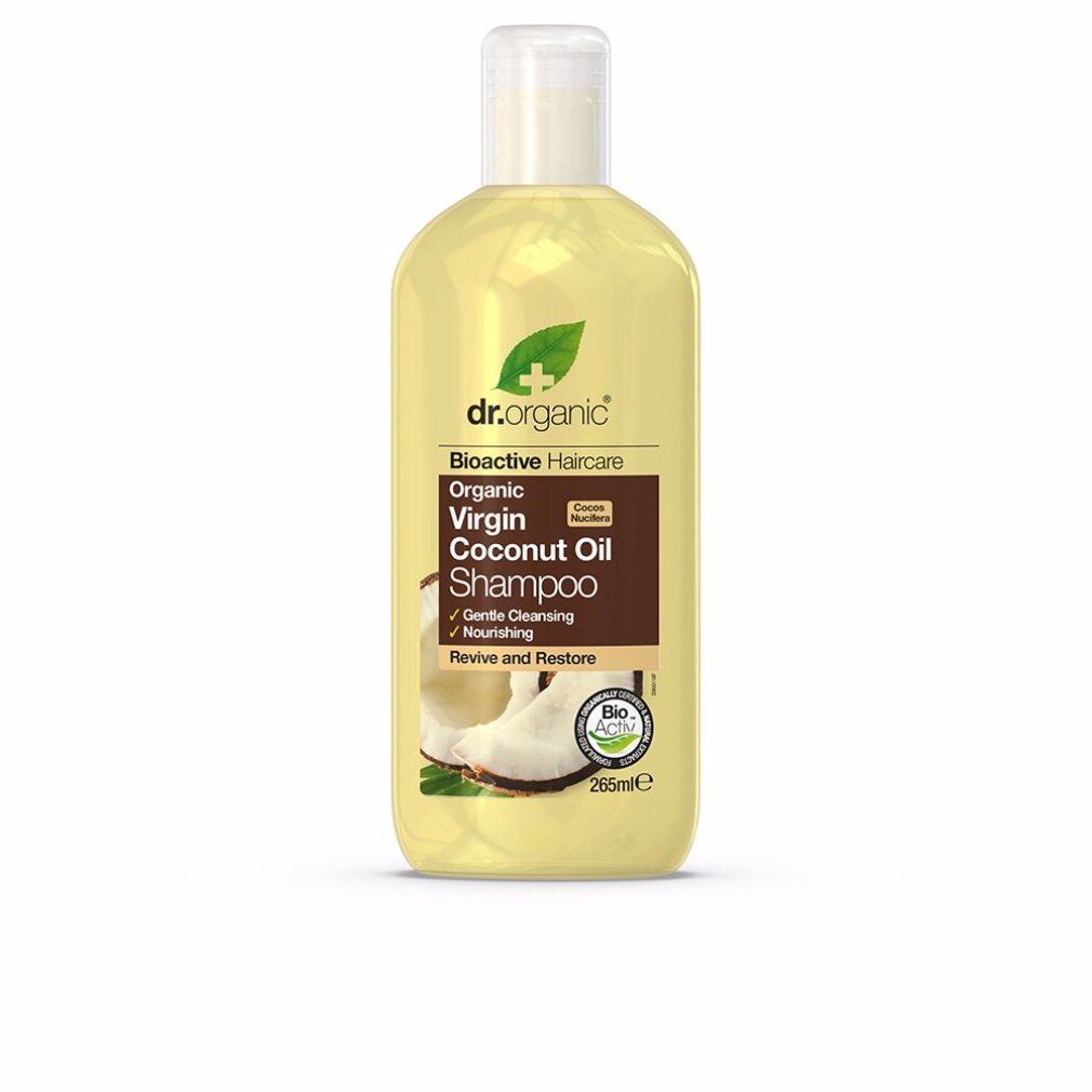 Dr. Organic Virgin Coconut Oil Shampoo. Gelbe Flasche mit weißem Deckel. Braunes Etikett mit Produktinformationen und Kokosnuss-Abbildung.