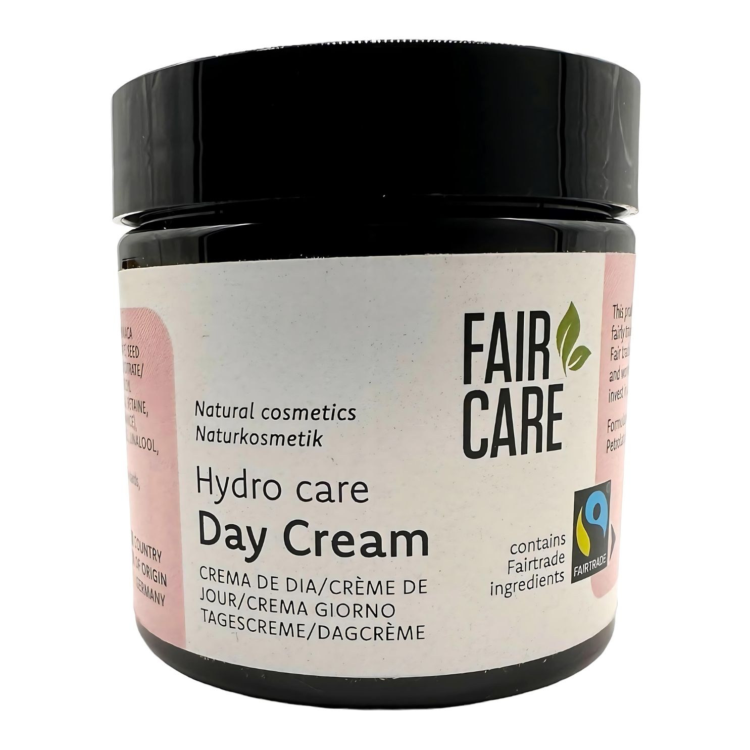 Tiegel FAIR CARE Tagescreme. Schwarzer Deckel, rosa Etikett mit Produktbezeichnung und Fairtrade-Siegel. Naturkosmetik.