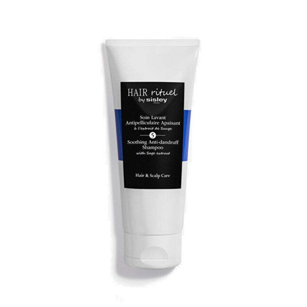 Weiße Tube mit blauem Streifen. Schwarzes Etikett mit Text: Hair Rituel by Sisley, Soin Lavant Antipelliculaire Apaisant, Soothing Anti-dandruff Shampoo.