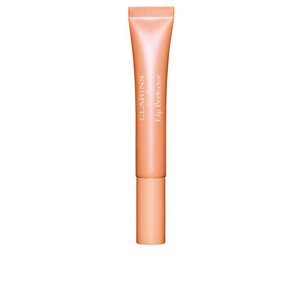 Clarins Lip Perfector in Pfirsich-Farbe. Tube mit Schraubverschluss. Produktname und Marke deutlich sichtbar.