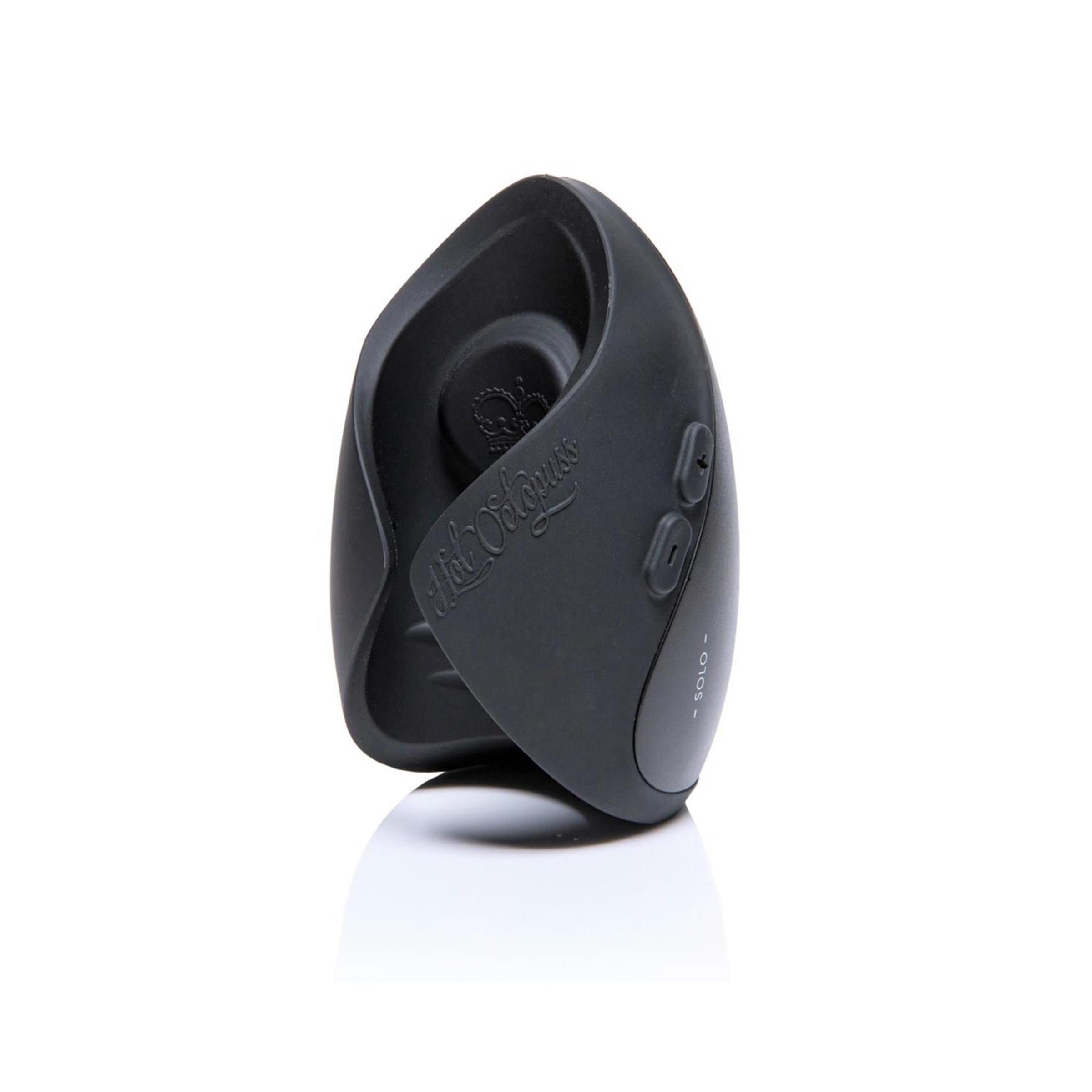 Schwarzes, ovales Gerät. Seitlich zwei Knöpfe. Marke Hot Octopuss.