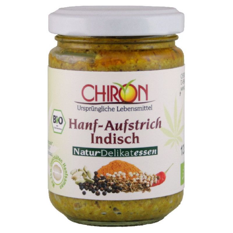 Glas mit Aufstrich. Weißer Deckel. Etikett mit "CHIRON", "Hanf-Aufstrich Indisch" und Bio-Siegel. Abbildung von Gewürzen.