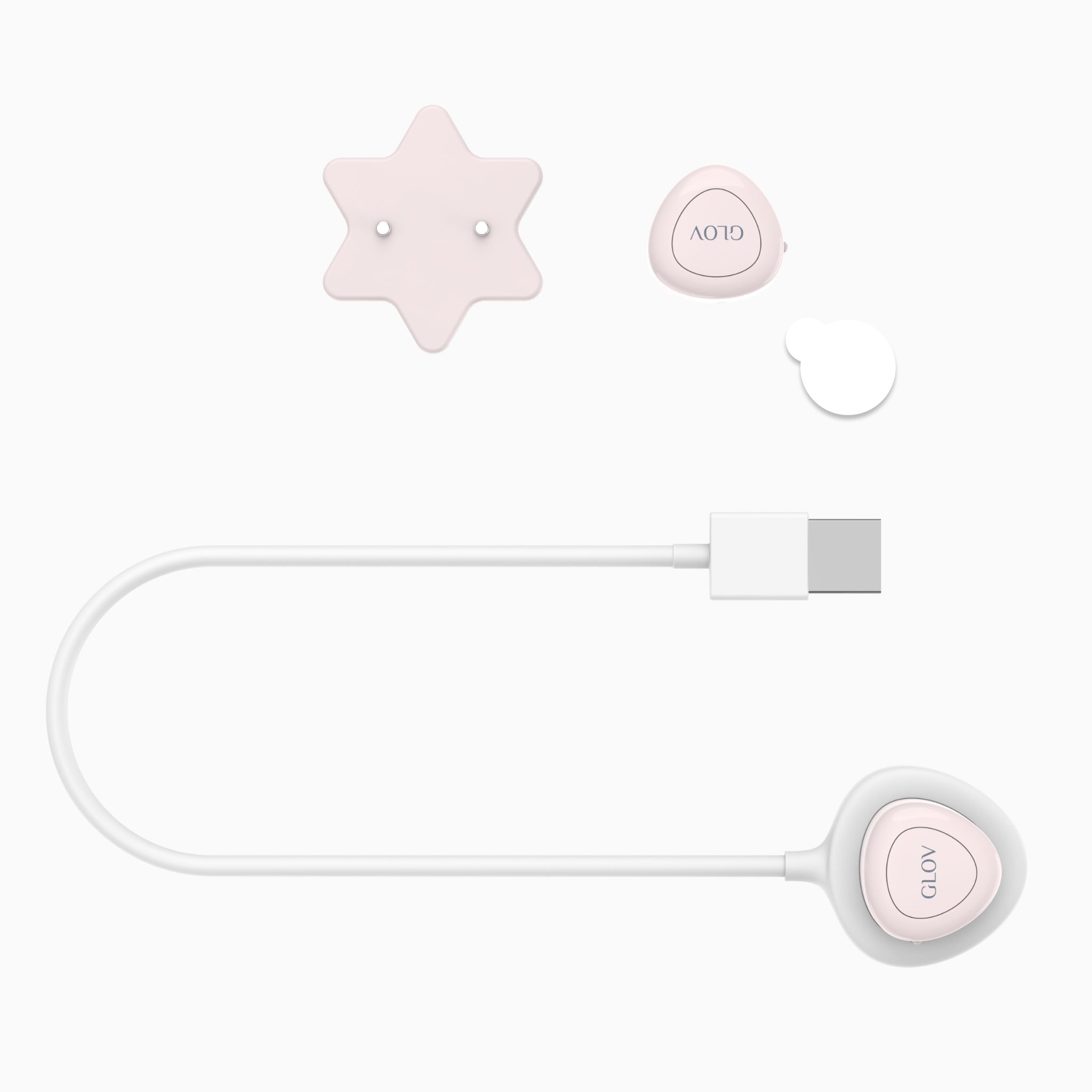 GLOV-Gerät mit Sternaufsatz, Ladekabel und einem kleinen runden Behälter.