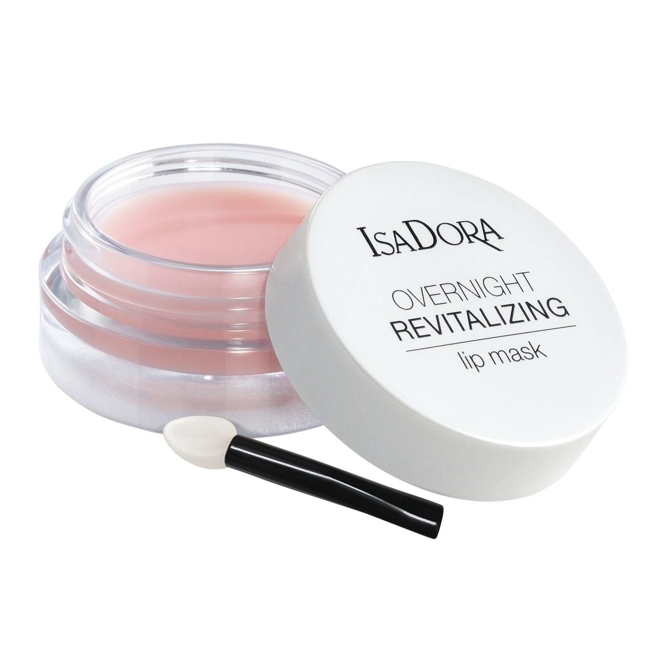 Offener Tiegel mit rosa Inhalt, weißem Deckel und Applikator. Deckel mit 'IsaDora Overnight Revitalizing lip mask' beschriftet.