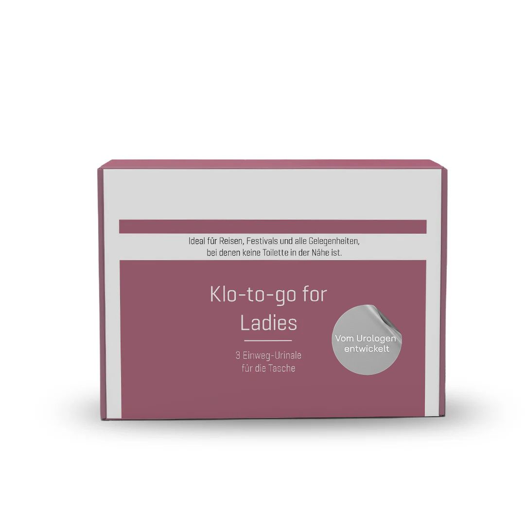 Kartonverpackung mit Aufschrift "Klo-to-go for Ladies". Text: Ideal für Reisen, Festivals und alle Gelegenheiten. Mit Siegel.