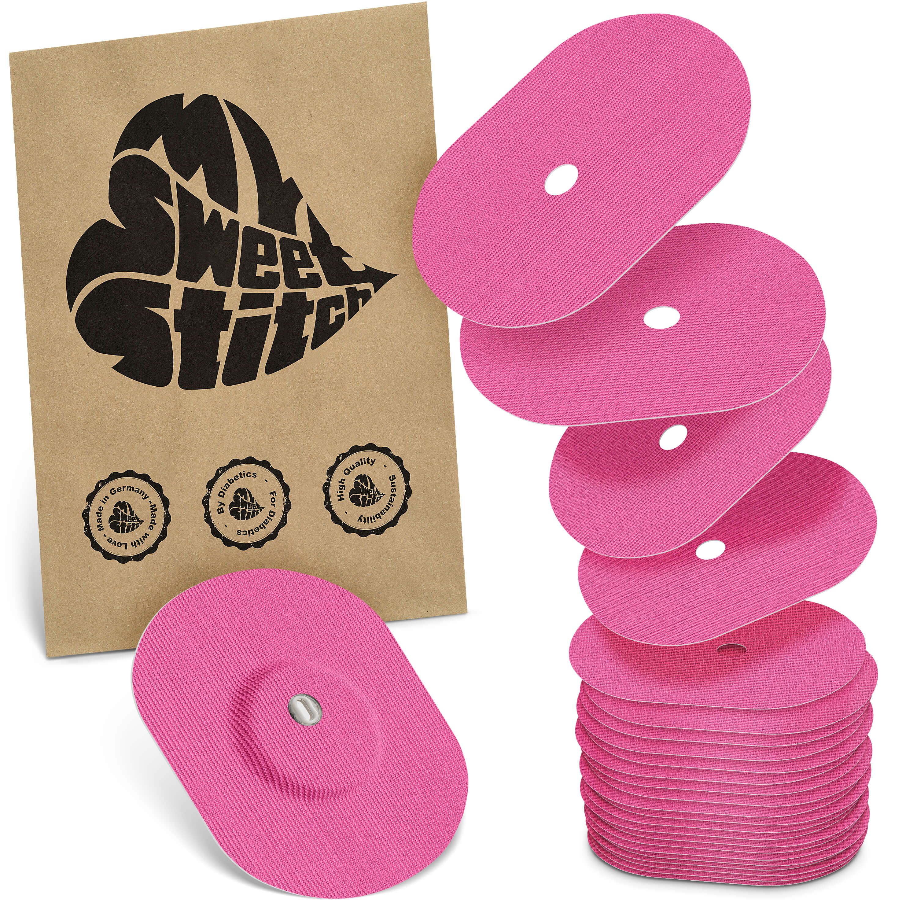 Rosa ovale Pflaster mit Loch, neben einer braunen Papiertüte mit Logo und mehreren Pflastern. Aufkleber mit Qualitätssiegel.