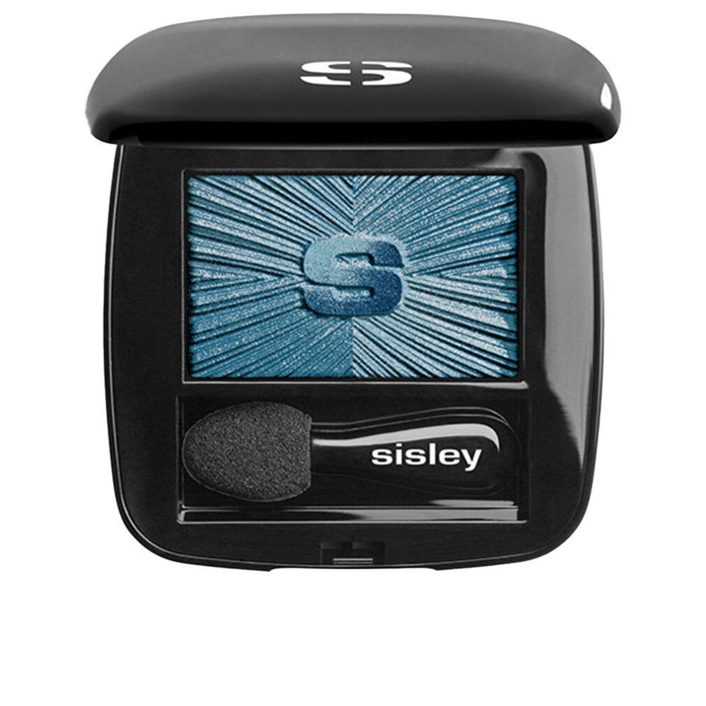 Geschlossener, schwarzer Sisley Lidschatten-Kompaktpuder. Blauer Lidschatten, Applikator, Logo.