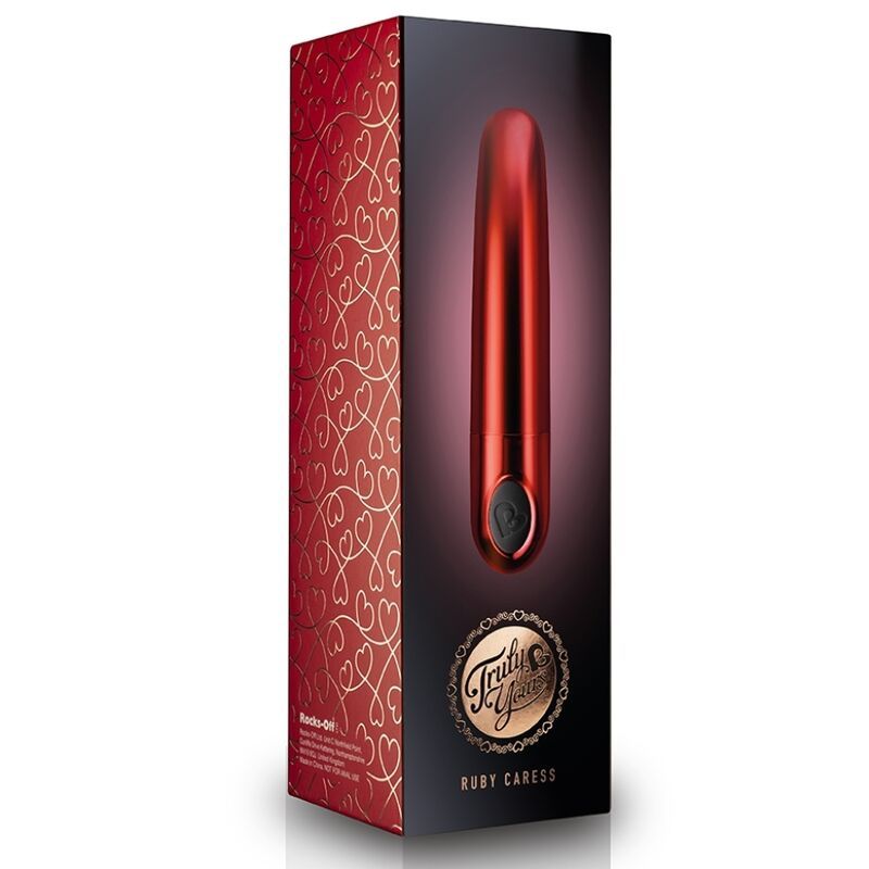 Roter Vibrator in Verpackung. Goldene Schrift: Truly Yours, Ruby Caress.