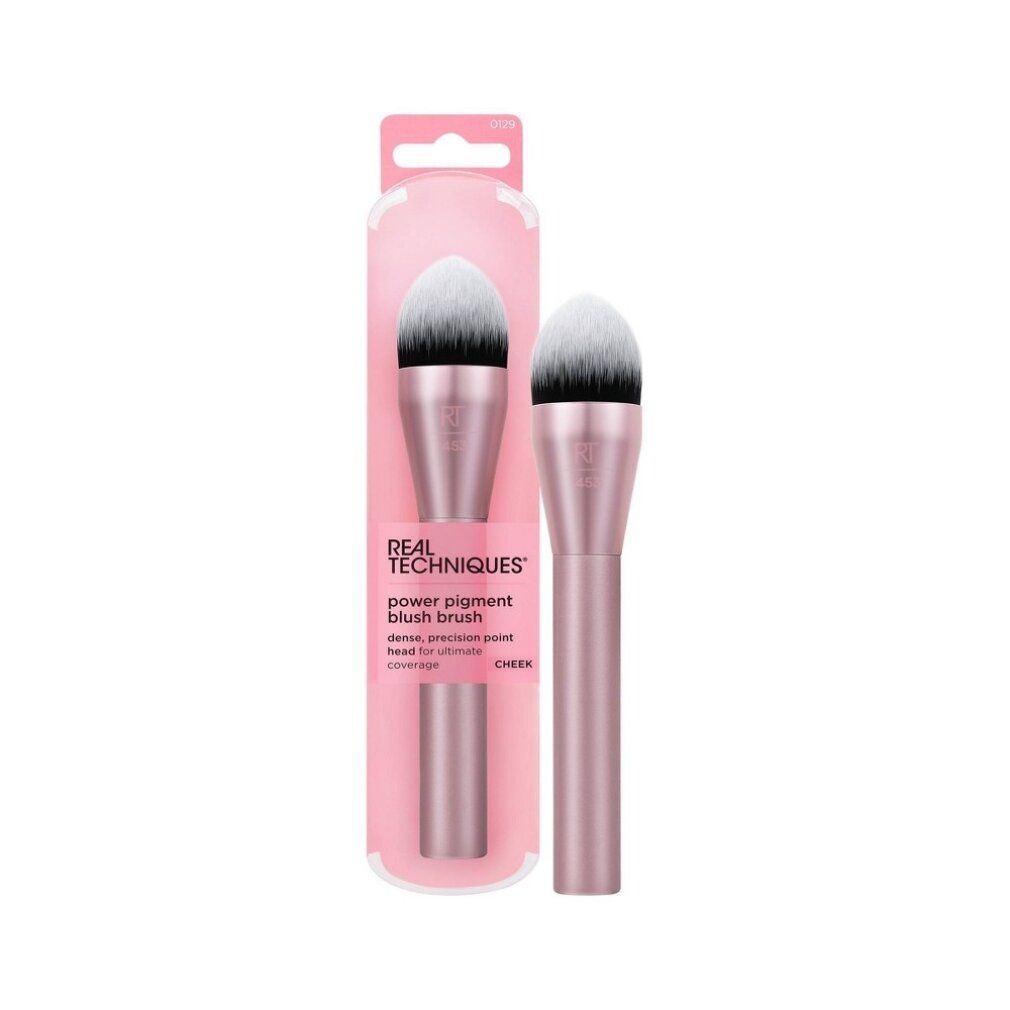 Zwei Rougepinsel in rosa Verpackung. Auf der Verpackung steht 'Real Techniques' und 'power pigment blush brush'.