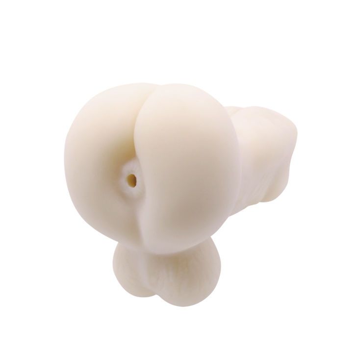 Elfenbeinfarbenes Masturbationsgerät. Geformt mit Öffnung und Hoden-Nachbildung. Detailreiche Oberfläche.