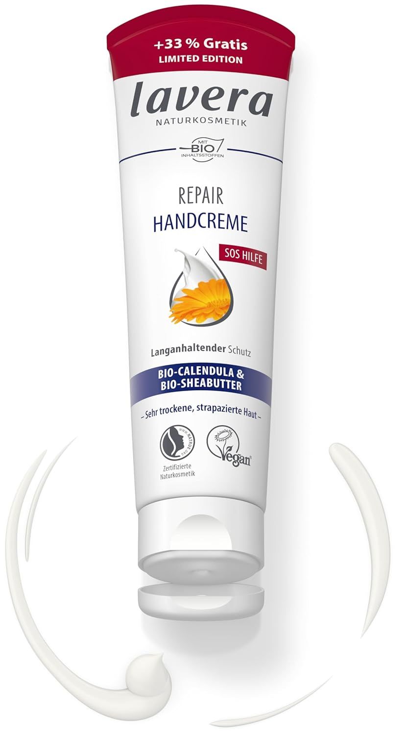 Weiße Tube mit rotem Deckel. Aufschrift: lavera Repair Handcreme. Enthält Bio-Calendula & Bio-Sheabutter. Vegan.