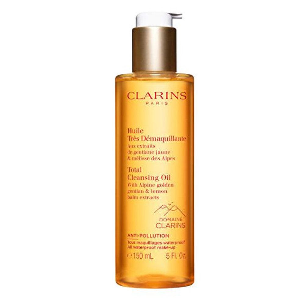 Clarins Total Cleansing Oil. Gelbe Flüssigkeit in Flasche mit Dosierpumpe. Beschriftung: Anti-Pollution, 150 ml, 5 Fl. Oz.