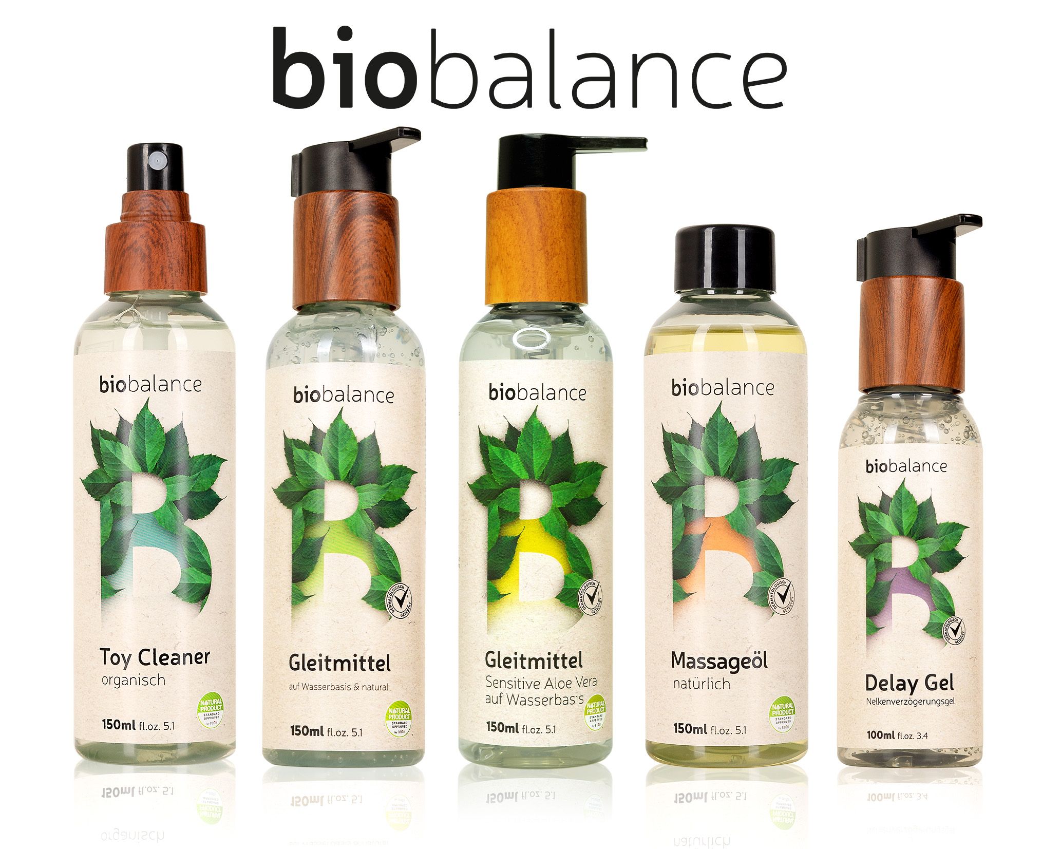 Fünf BIO BALANCE Produkte: Toy Cleaner, Gleitmittel, Sensitive Aloe, Massageöl, Delay Gel. Alle mit Holzdeckel.