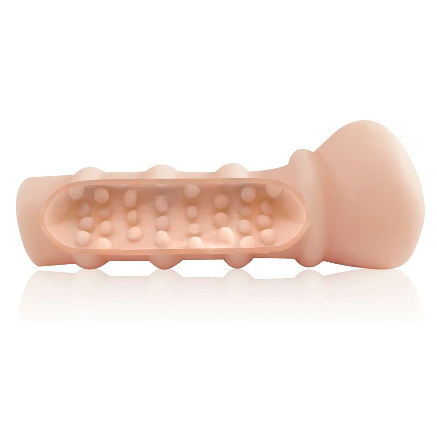 Ein hautfarbener Vibrator mit Noppenmuster und Ringen.