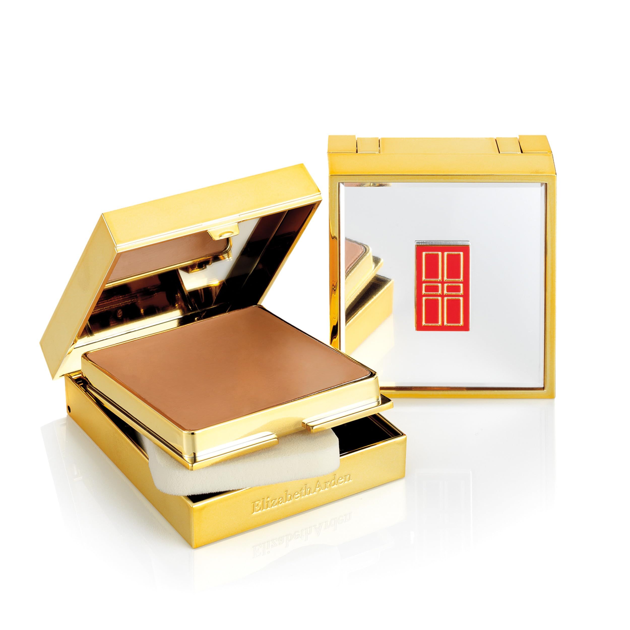 Goldfarbene Make-up-Kompaktverpackung mit Spiegel und Schwamm. Der Deckel ist geöffnet.