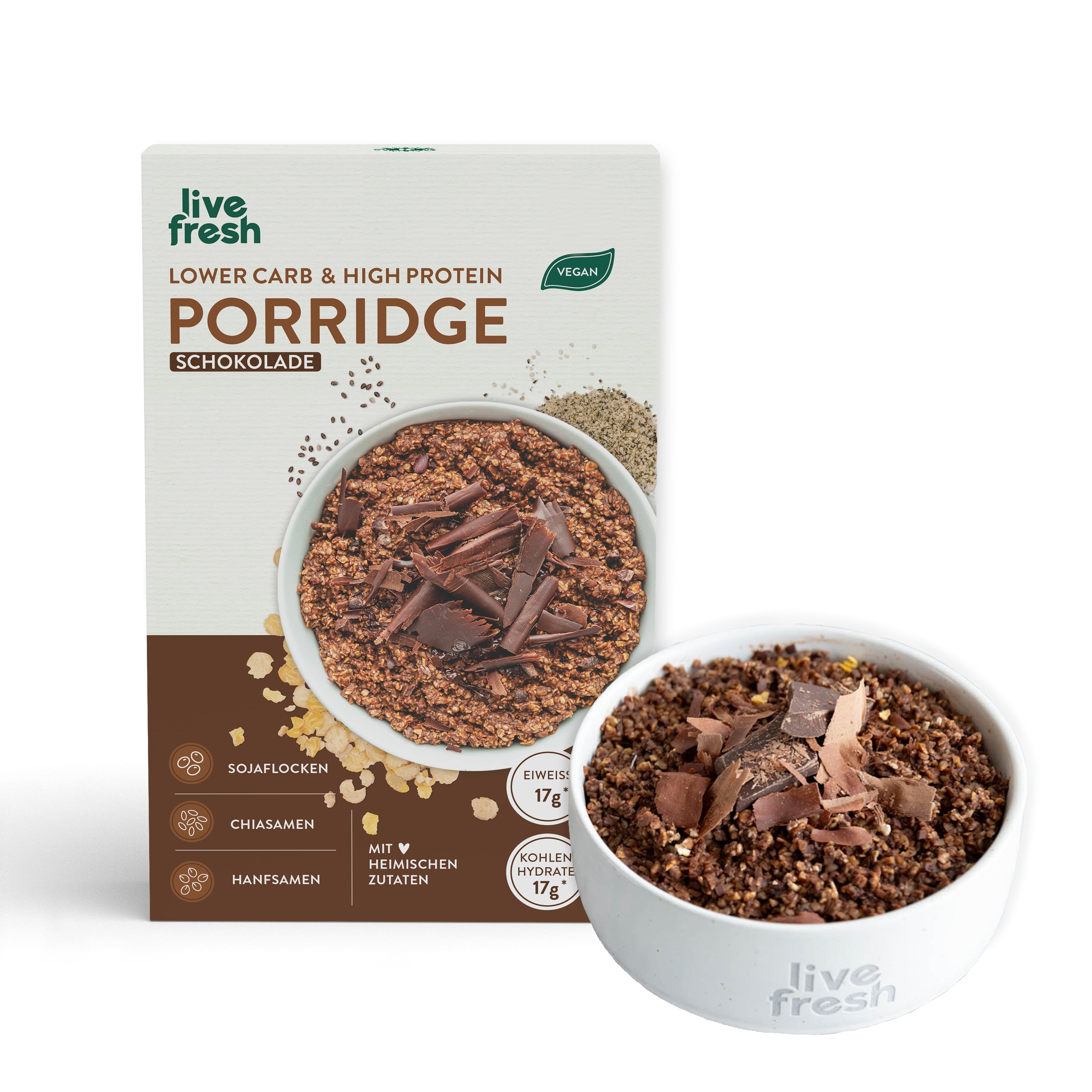 Porridge Schoko in Schachtel und Schüssel. Schachtel mit Logo, Text und Vegan-Siegel. Schüssel mit Porridge und Schokostückchen.