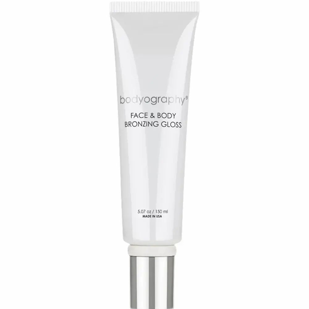 Weiße Tube mit silbernem Verschluss. Aufschrift: BODYOGRAPHY FACE & BODY BRONZING GLOSS. Volumenangabe: 5.07 oz / 150 ml.