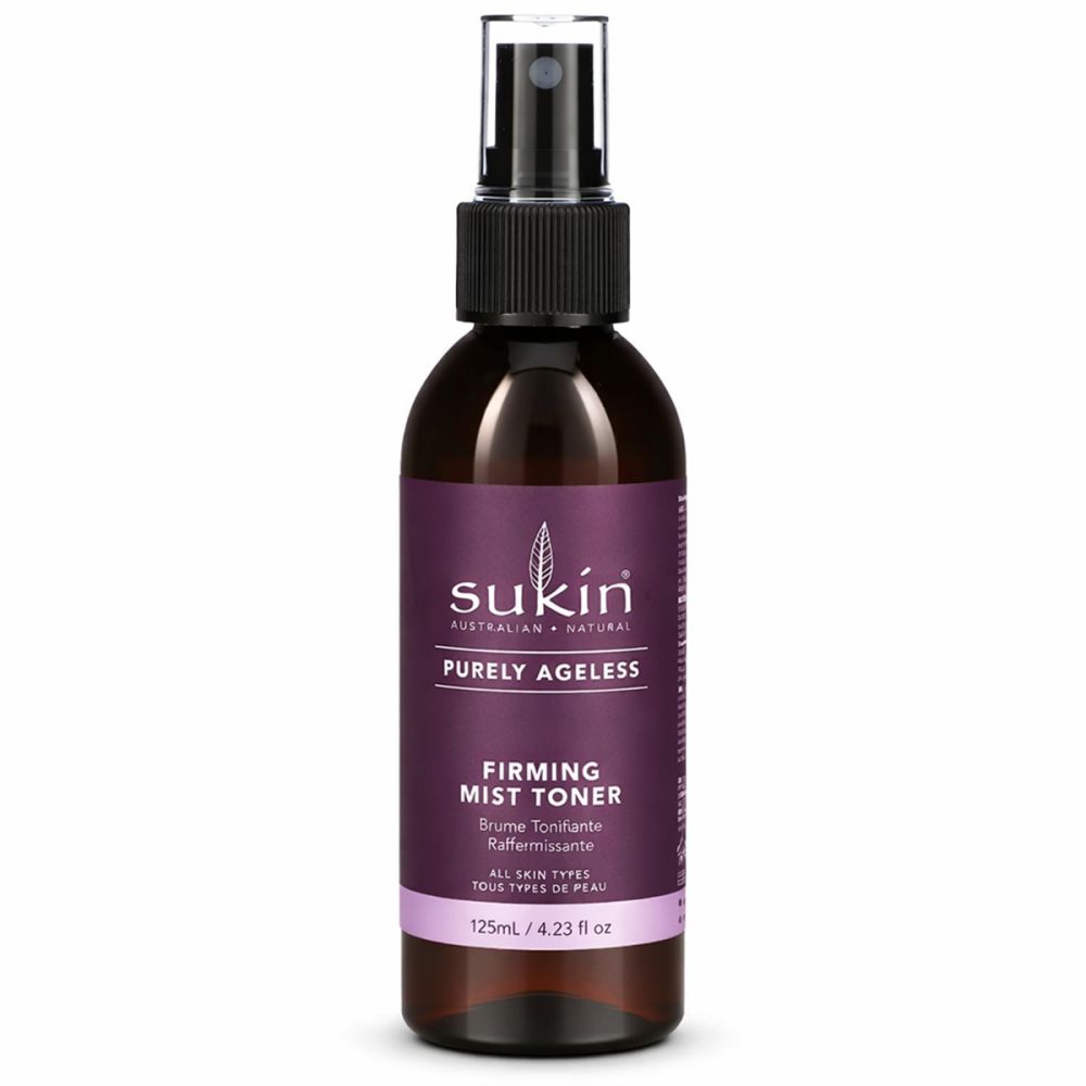 Braune Sprühflasche mit lila Etikett. Text: Sukin, Purely Ageless, Firming Mist Toner. Mit Früchten und Blättern dekoriert.