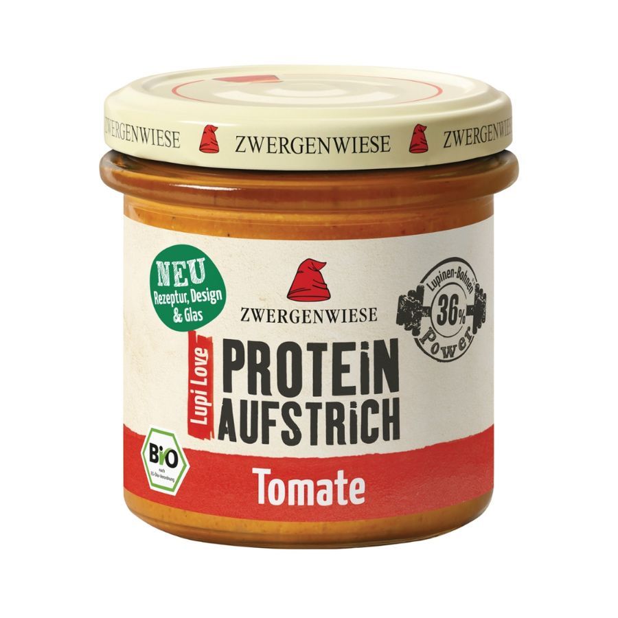 Glas mit Aufstrich. Aufschrift: Protein Aufstrich Tomate, Zwergenwiese, Bio-Siegel. Deckel mit Logo.