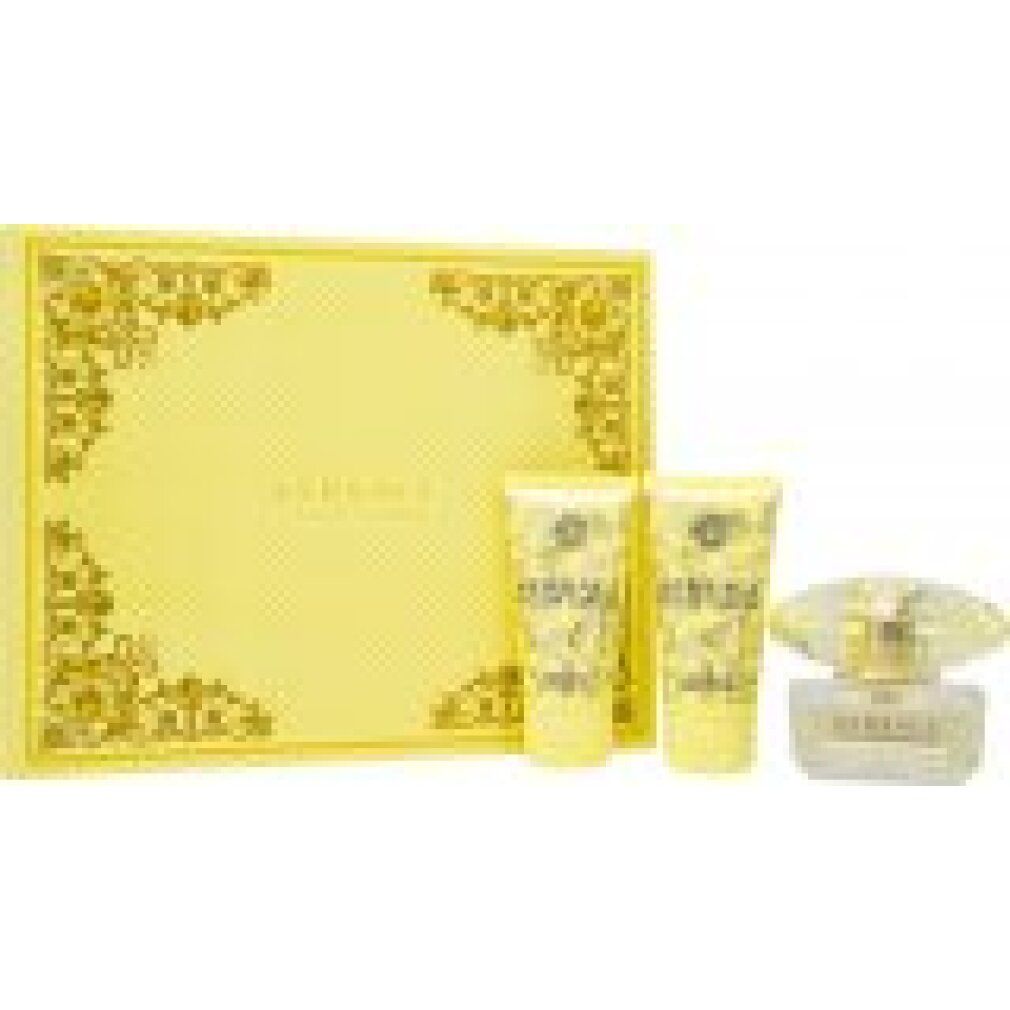 Gelbes Versace Geschenkset mit Flakon, zwei Tuben und einer Schachtel mit goldenen Verzierungen.