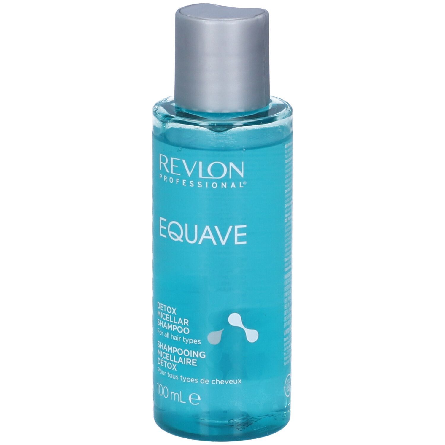 Transparente Flasche mit blauem Shampoo. Silberner Deckel. Produktetikett mit Text: Revlon Professional Equave.