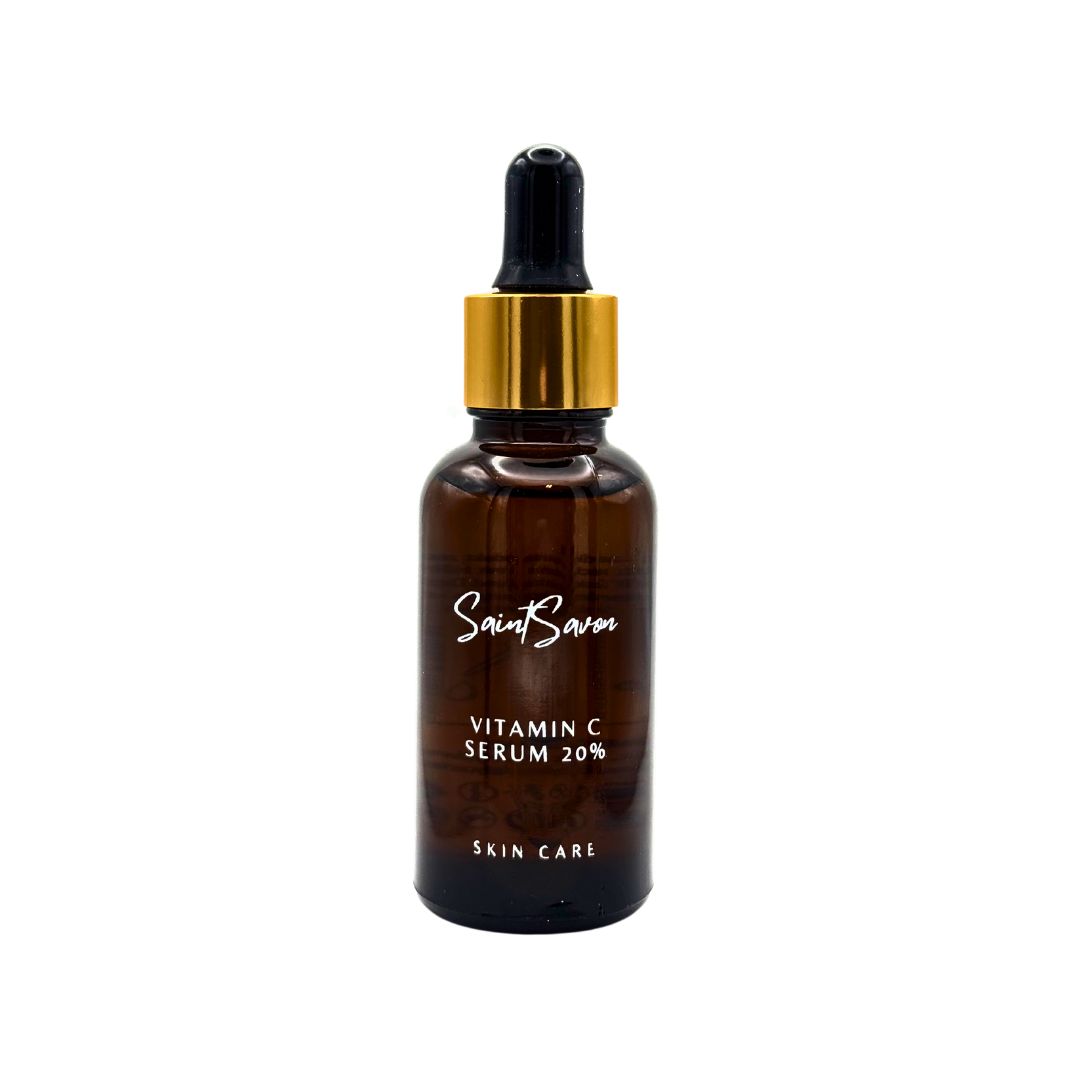 Braune Glasflasche mit goldener Pipette. Aufschrift: Saint Savon Vitamin C Serum 20% Skin Care.