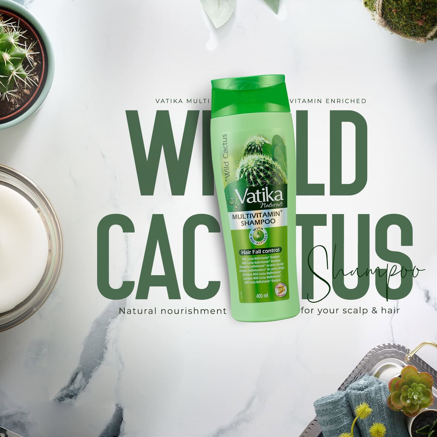 Werbebild mit Shampoo-Flasche, Kaktus und Text: "Vatika Naturals Wild Cactus Shampoo". Aufschrift: "Hair Fall control".