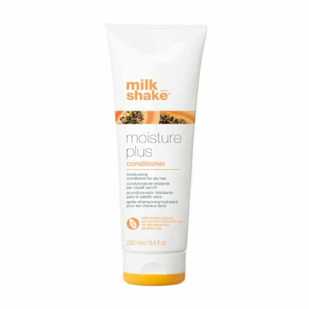 Weiße Tube mit orangefarbenem Deckel. Aufschrift: milk_shake moisture plus conditioner. Text in mehreren Sprachen.