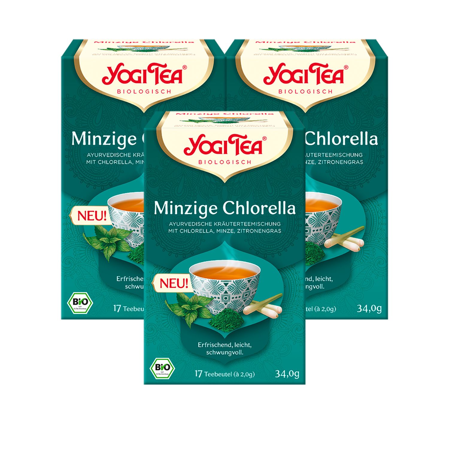 Drei Packungen Yogi Tea Minzige Chlorella. Grün-weiße Verpackung mit Logo und Produktbezeichnung. Bio-Siegel.