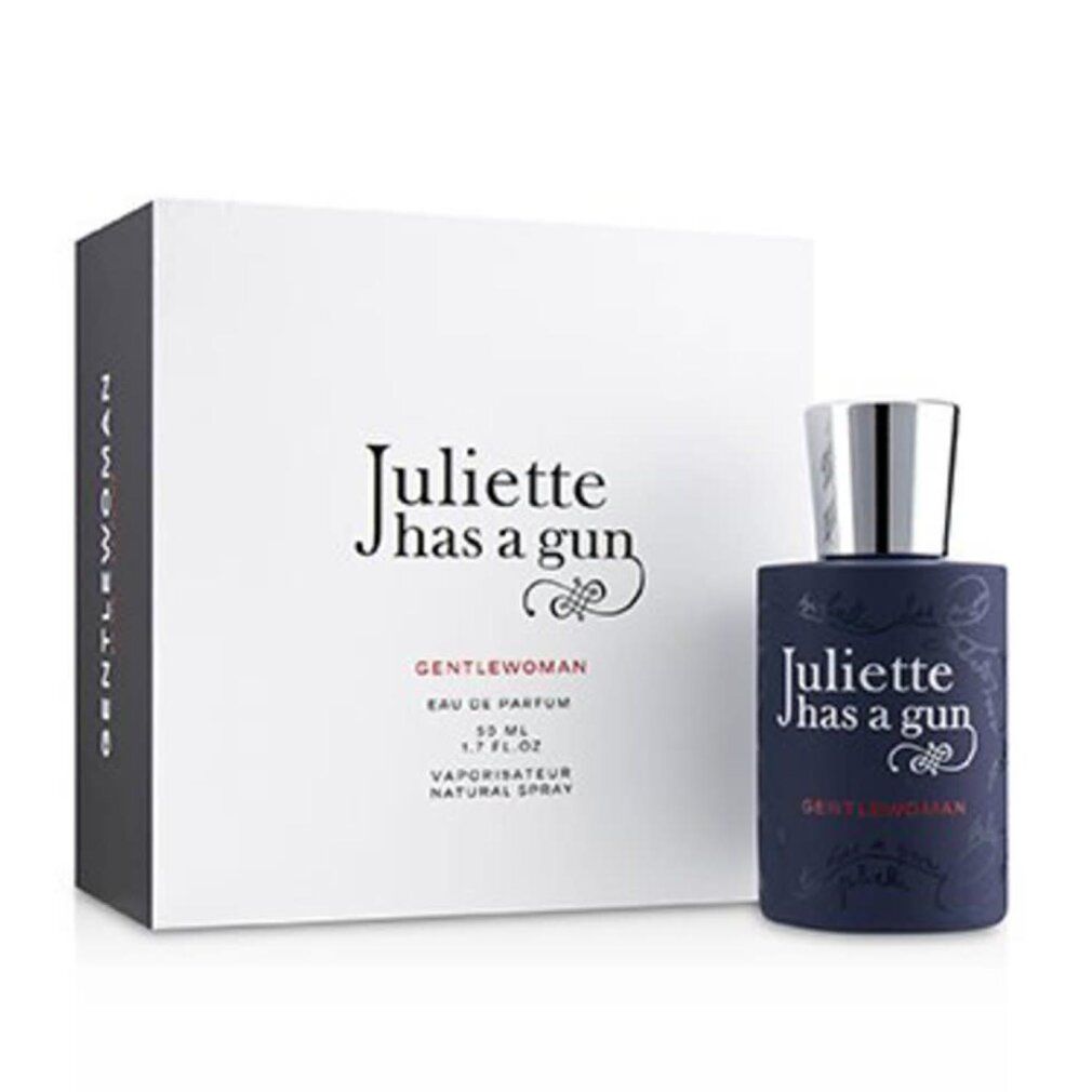 Dunkelblaue Parfumflasche und weiße Schachtel. Auf der Flasche und Schachtel steht "Juliette has a gun Gentlewoman".